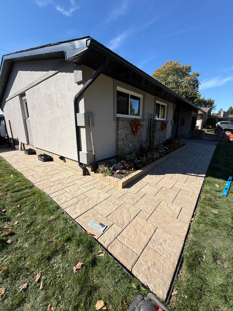 After - paver walkway and garden bed installation